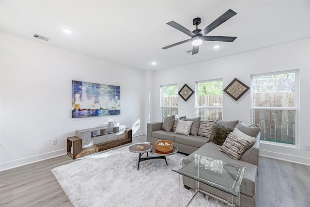8132 Brandon St, Houston, TX 77051 - living room with visible vents, ceiling fan, wood finished floors, and baseboards