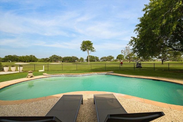 view of pool featuring a lawn, a fenced in pool, and a fenced backyard