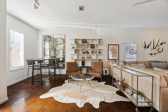 interior space featuring visible vents and baseboards