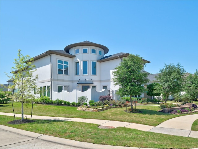 19103 Timpson Dr, Cypress, TX 77433 - view of front of house with a front yard and stucco siding