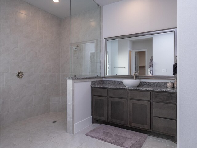 19103 Timpson Dr, Cypress, TX 77433 - bathroom with a walk in shower, vanity, and tile patterned flooring