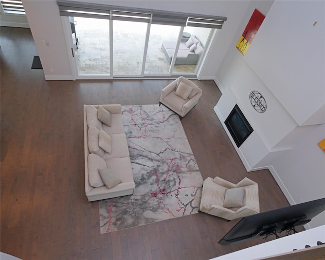 19103 Timpson Dr, Cypress, TX 77433 - bedroom featuring wood finished floors, baseboards, and a fireplace