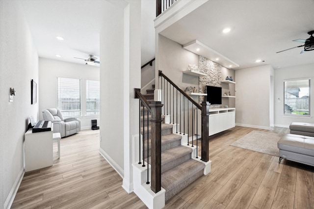 29035 Nectar Island Ln, Katy, TX 77494 - stairs featuring a ceiling fan, healthy amount of natural light, wood finished floors, and recessed lighting