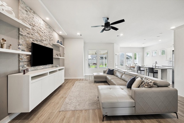 29035 Nectar Island Ln, Katy, TX 77494 - living room featuring ceiling fan, light wood-type flooring, recessed lighting, and baseboards