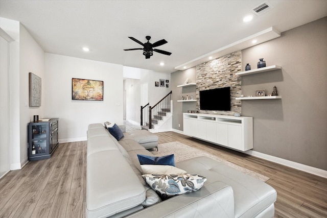 29035 Nectar Island Ln, Katy, TX 77494 - living area featuring light wood-style floors, ceiling fan, baseboards, and recessed lighting