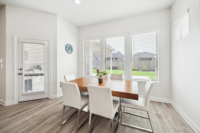29035 Nectar Island Ln, Katy, TX 77494 - dining room featuring light wood-type flooring and baseboards