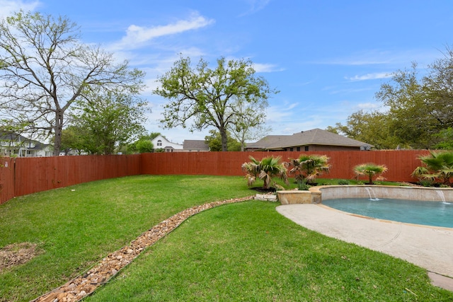 view of yard with a fenced backyard