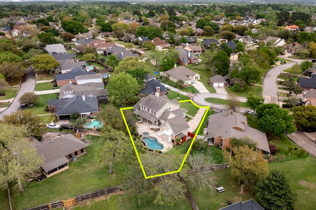 birds eye view of property with a residential view