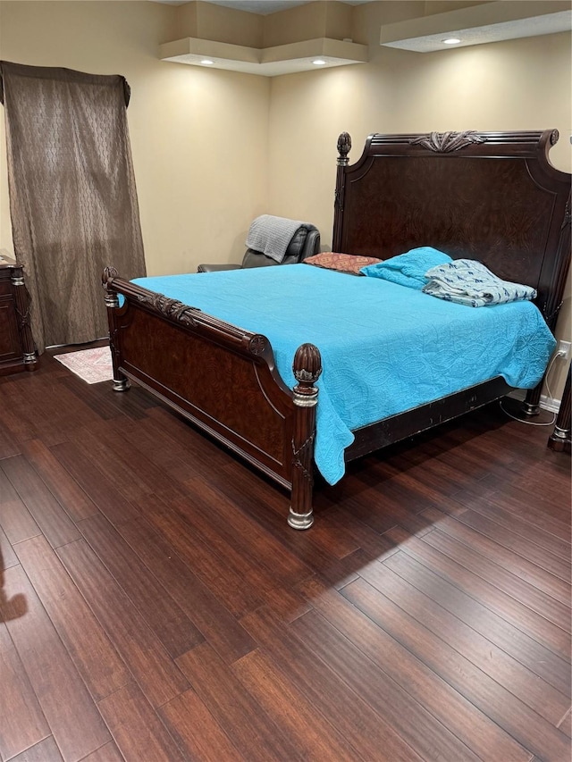 bedroom featuring wood finished floors