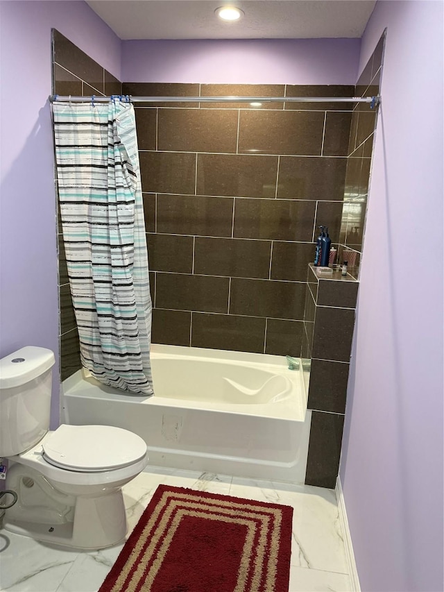 bathroom with toilet, marble finish floor, and shower / bath combination with curtain