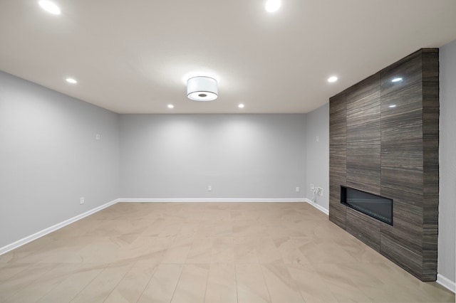 8954 Chatsworth Dr, Houston, TX 77024 - unfurnished living room with recessed lighting, a large fireplace, and baseboards