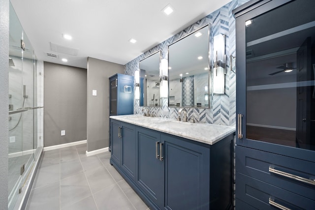 8954 Chatsworth Dr, Houston, TX 77024 - full bath featuring a stall shower, vanity, decorative backsplash, tile patterned flooring, and recessed lighting