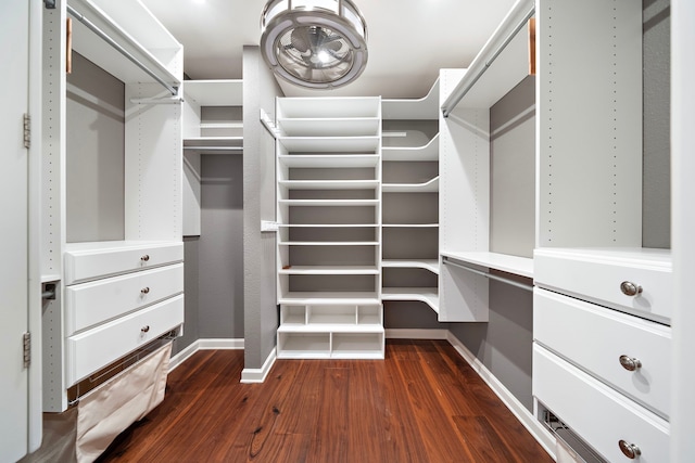 8954 Chatsworth Dr, Houston, TX 77024 - spacious closet featuring dark wood-style flooring