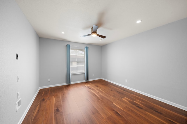 8954 Chatsworth Dr, Houston, TX 77024 - unfurnished room featuring ceiling fan, dark wood-type flooring, baseboards, and recessed lighting