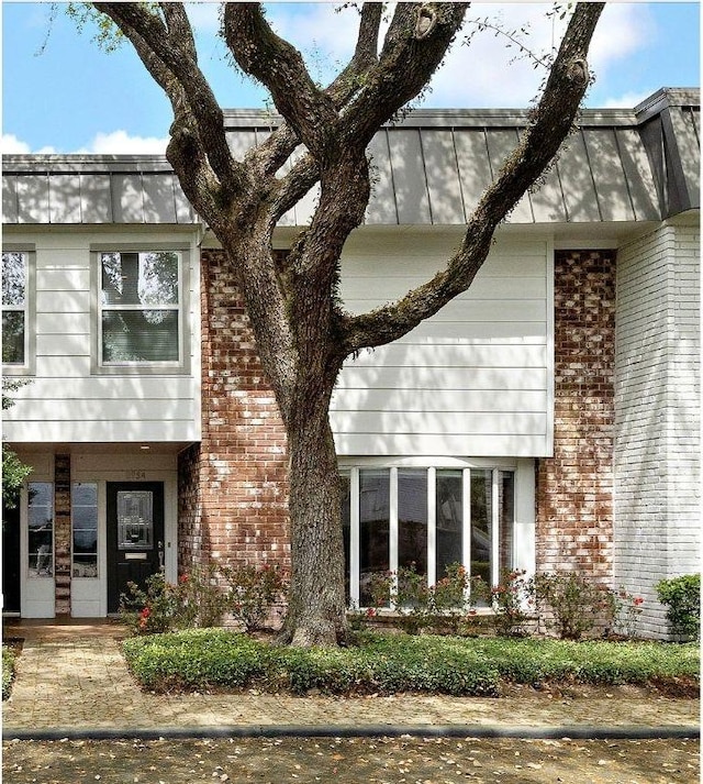 8954 Chatsworth Dr, Houston, TX 77024 - view of front of property with brick siding