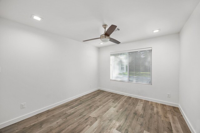 4626 Ella Blvd, Houston, TX 77018 - unfurnished room with wood finished floors, baseboards, and ceiling fan