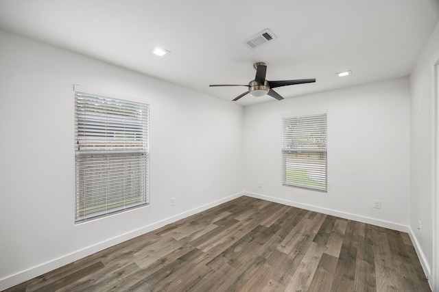 4626 Ella Blvd, Houston, TX 77018 - spare room with a ceiling fan, dark wood-style floors, and baseboards