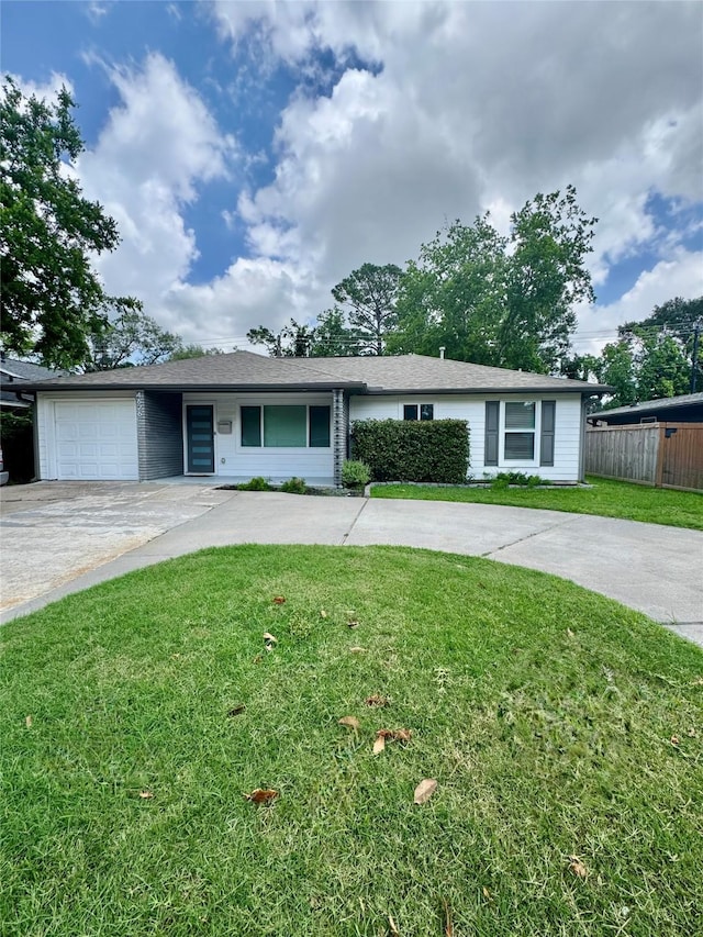 4626 Ella Blvd, Houston, TX 77018 - ranch-style house featuring concrete driveway and a garage