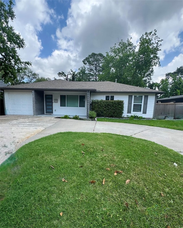 4626 Ella Blvd, Houston, TX 77018 - ranch-style home with curved driveway and an attached garage