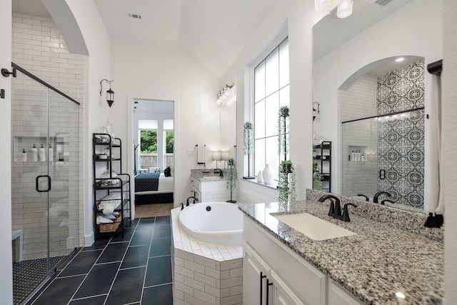 2514 Heritage Park Dr, Missouri City, TX 77459 - full bathroom with tile patterned floors, a shower stall, a garden tub, and a sink