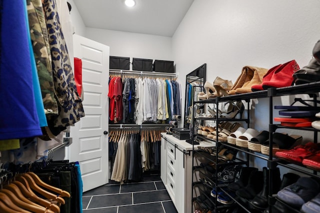 2514 Heritage Park Dr, Missouri City, TX 77459 - spacious closet with dark tile patterned floors