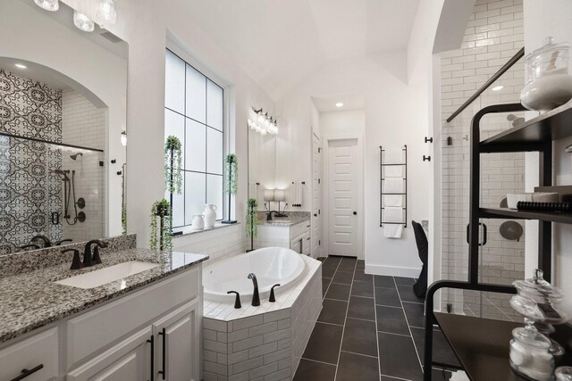 2514 Heritage Park Dr, Missouri City, TX 77459 - bathroom with a stall shower, a garden tub, tile patterned flooring, and a sink
