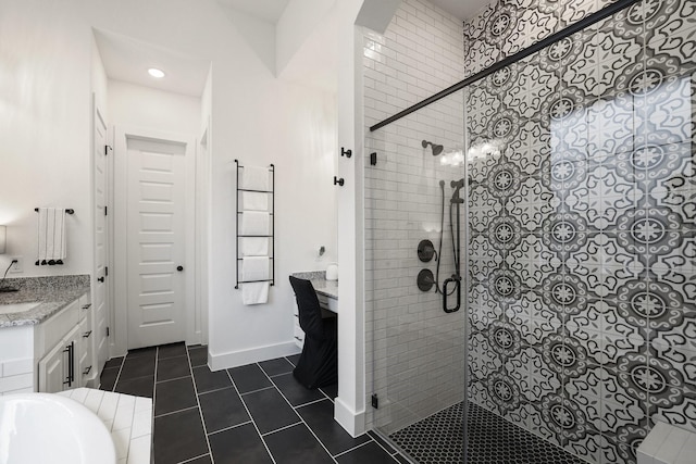 2514 Heritage Park Dr, Missouri City, TX 77459 - bathroom featuring a stall shower, baseboards, recessed lighting, tile patterned floors, and vanity