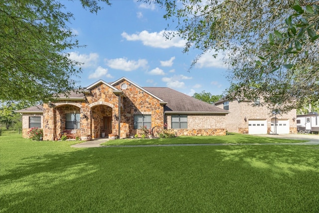 3650 Ward Bend Rd, Sealy, TX 77474 - view of front of property featuring roof with shingles, driveway, stone siding, and a front lawn