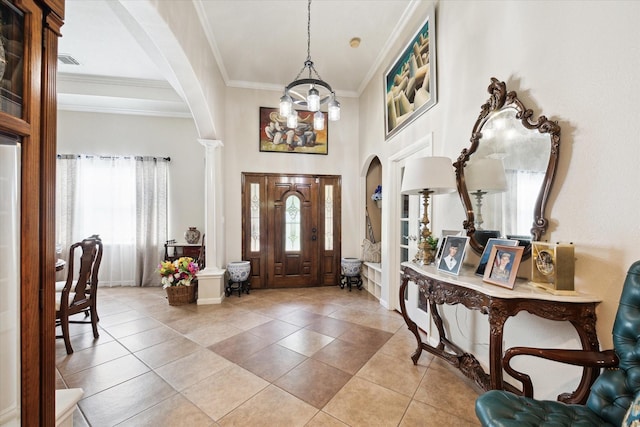3650 Ward Bend Rd, Sealy, TX 77474 - foyer featuring ornamental molding, a wealth of natural light, and arched walkways