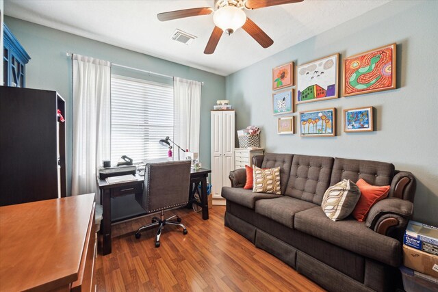 3650 Ward Bend Rd, Sealy, TX 77474 - office space featuring visible vents, a ceiling fan, and wood finished floors