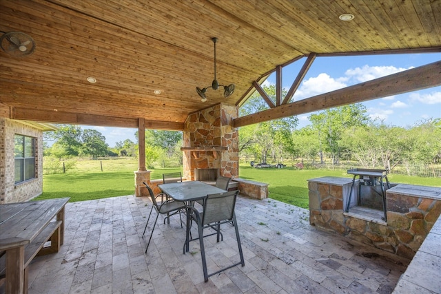 3650 Ward Bend Rd, Sealy, TX 77474 - view of patio / terrace featuring outdoor dining area and an outdoor stone fireplace