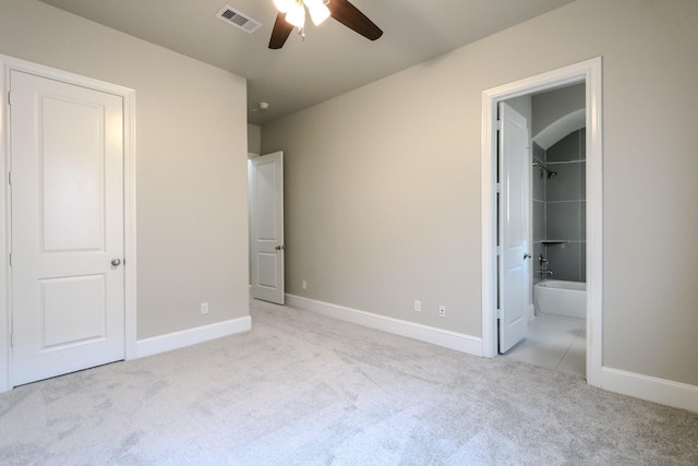 unfurnished bedroom featuring carpet flooring, baseboards, and visible vents
