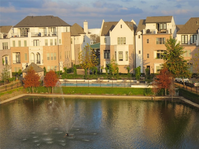 view of water feature with a residential view