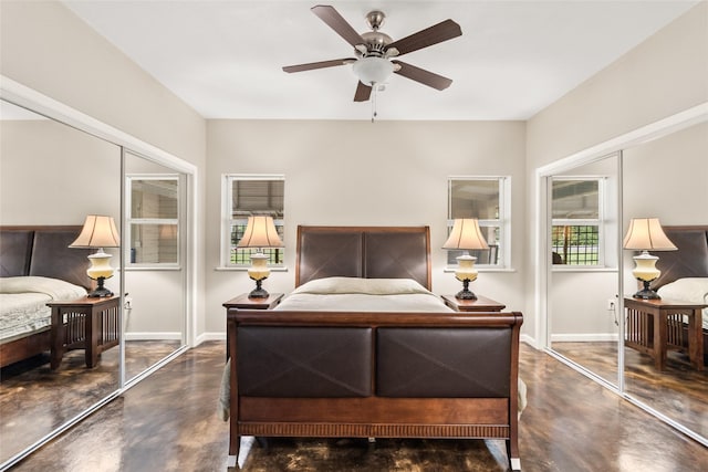 bedroom featuring concrete floors, baseboards, and a ceiling fan