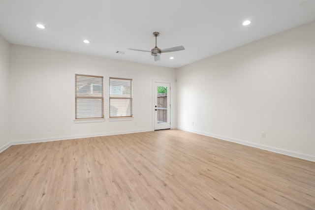 5710 Elysian St, Houston, TX 77009 - unfurnished room featuring light wood-style flooring, a ceiling fan, recessed lighting, and baseboards