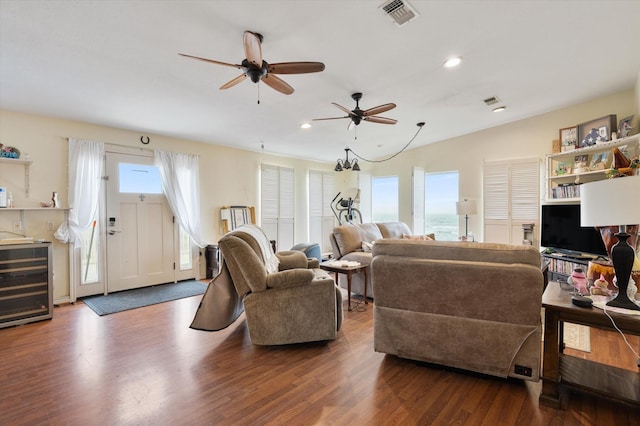 12802 Bermuda Beach Dr, Galveston, TX 77554 - living room featuring a ceiling fan, wood finished floors, recessed lighting, and beverage cooler