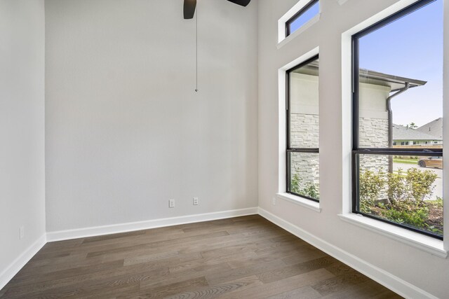 9618 Leafgate Ct, Missouri City, TX 77459 - unfurnished room featuring wood finished floors, plenty of natural light, and baseboards