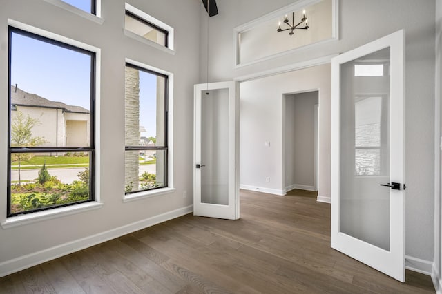 9618 Leafgate Ct, Missouri City, TX 77459 - entrance foyer with wood finished floors, french doors, and baseboards