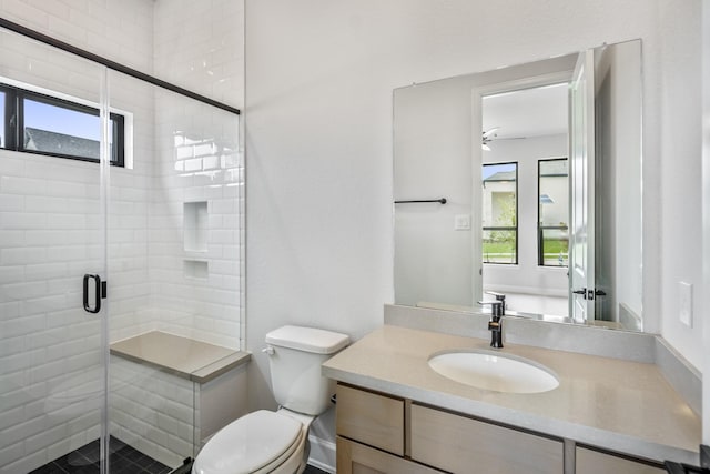 9618 Leafgate Ct, Missouri City, TX 77459 - bathroom with plenty of natural light, toilet, a stall shower, and vanity