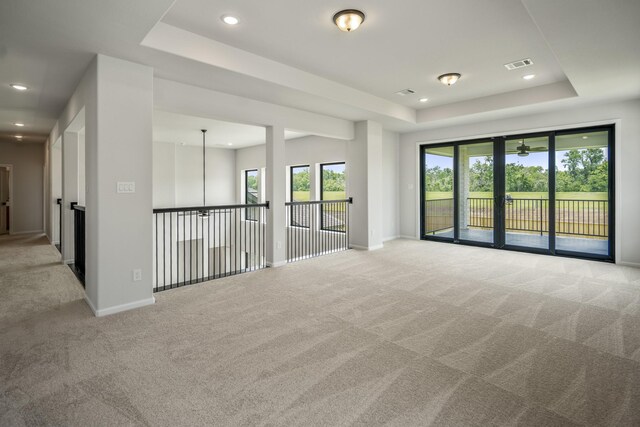 9618 Leafgate Ct, Missouri City, TX 77459 - unfurnished room with a raised ceiling, carpet flooring, baseboards, recessed lighting, and ceiling fan