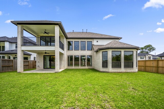 9618 Leafgate Ct, Missouri City, TX 77459 - back of house featuring ceiling fan, a patio, a shingled roof, and a balcony