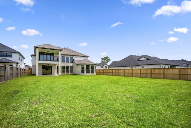 9618 Leafgate Ct, Missouri City, TX 77459 - rear view of house with a ceiling fan, a patio, and a balcony