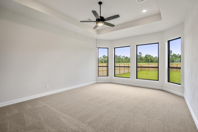 9618 Leafgate Ct, Missouri City, TX 77459 - empty room featuring baseboards, carpet flooring, a raised ceiling, and recessed lighting