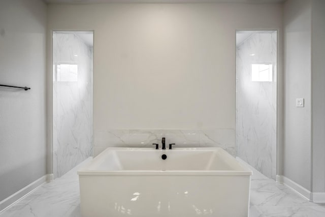 9618 Leafgate Ct, Missouri City, TX 77459 - full bath featuring marble finish floors and a freestanding bath