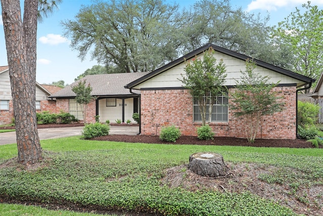 3309 Knob Hill St, Deer Park, TX 77536 - single story home featuring a front lawn, driveway, and brick siding