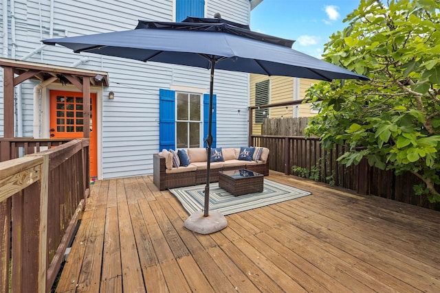 wooden deck featuring an outdoor hangout area