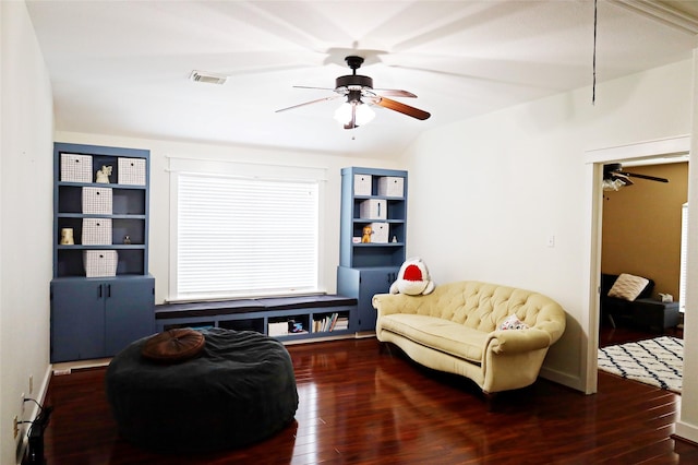 sitting room with wood-type flooring, a ceiling fan, and visible vents