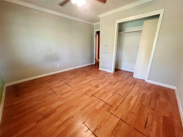 105 Longridge Dr, La Marque, TX 77568 - unfurnished bedroom with a closet, light wood-style flooring, baseboards, and crown molding