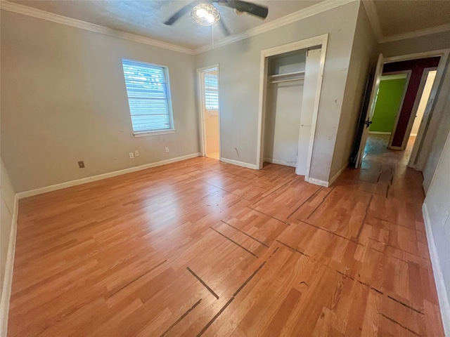105 Longridge Dr, La Marque, TX 77568 - unfurnished bedroom with light wood-style flooring, baseboards, and ornamental molding