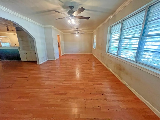105 Longridge Dr, La Marque, TX 77568 - empty room featuring a ceiling fan, wood finished floors, baseboards, and ornamental molding